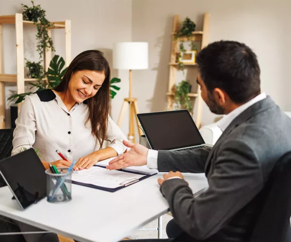 young-woman-successfully-signs-a-contract-with-a-b-2023-11-27-05-18-31-2KNG7J3